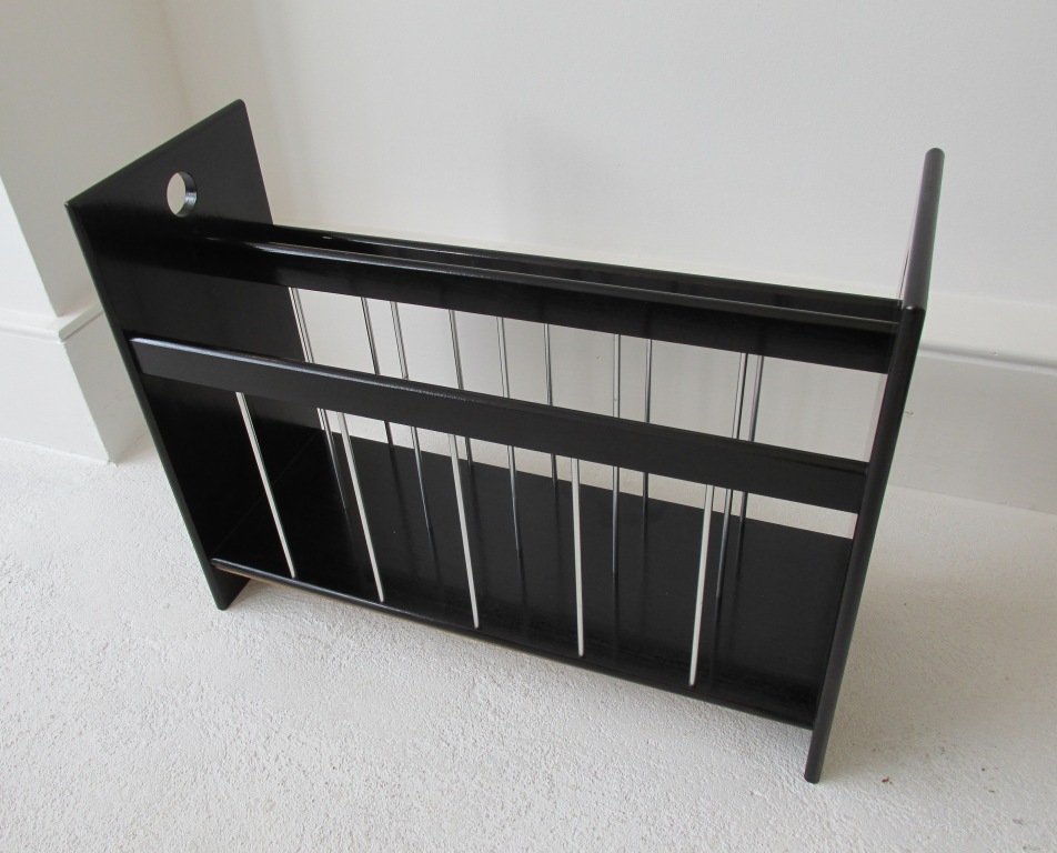 Ebonised magazine rack