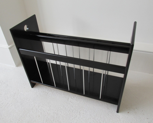 Ebonised magazine rack